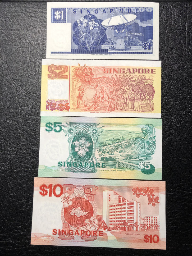 《外钞收藏家》第七十七期拍卖 新加坡船版 1、2、5、10 全新unc