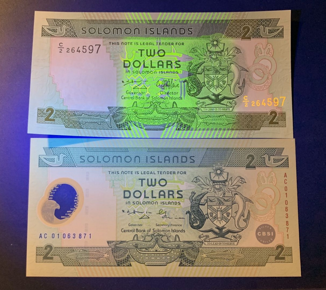 紫瑗钱币—微拍第42期—纸币场 所罗门群岛 2元 2枚一组 一枚纪念钞（塑料）一张纸钞