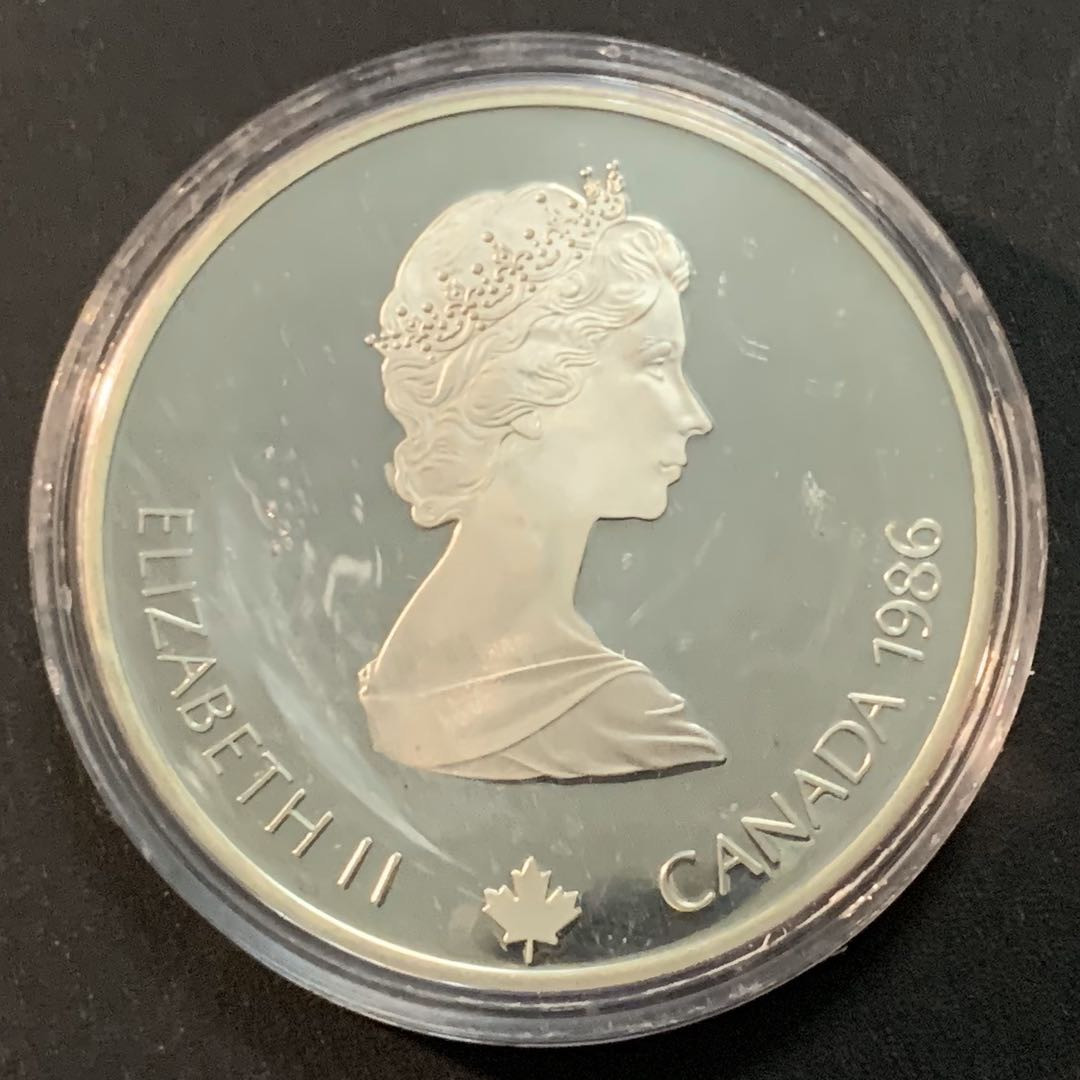 紫瑗钱币—微拍第46期  加拿大 1986年 卡尔加里冬奥会 冰球 20元  34.1克 0.925银 精制