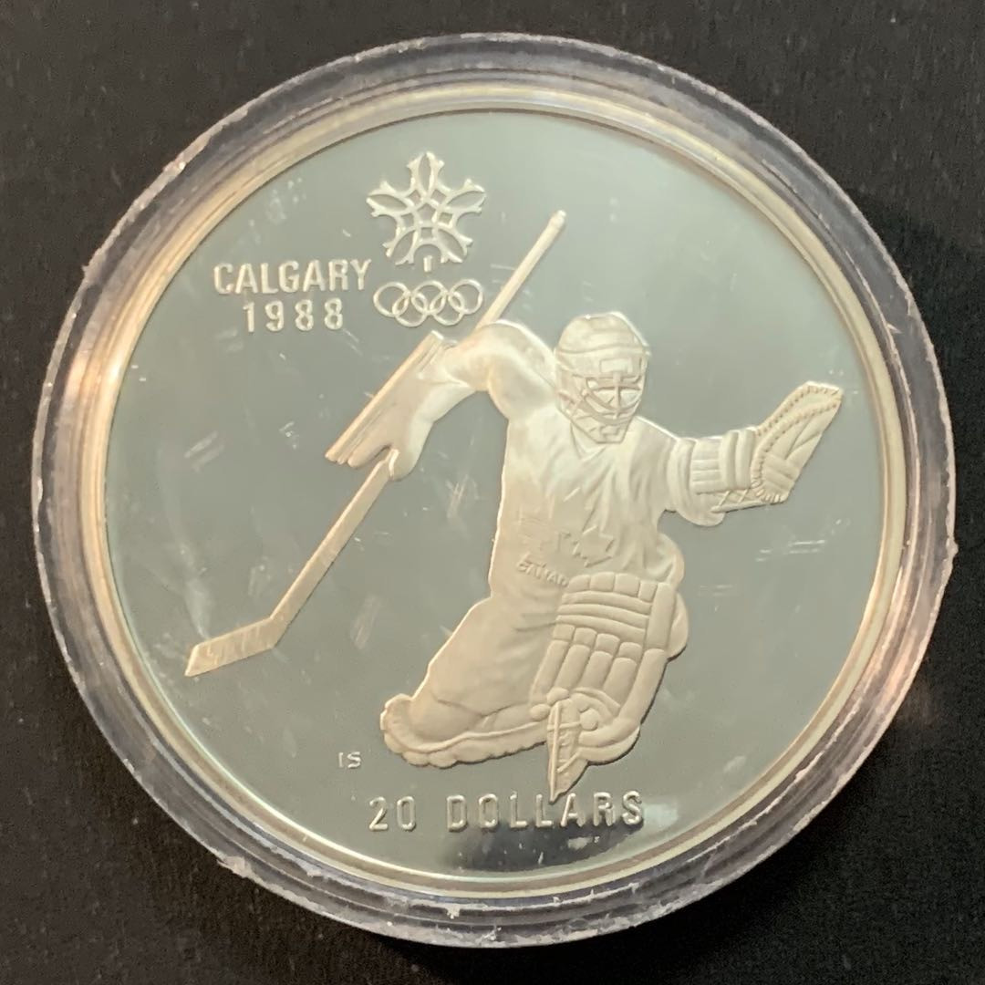 紫瑗钱币—微拍第46期  加拿大 1986年 卡尔加里冬奥会 冰球 20元  34.1克 0.925银 精制