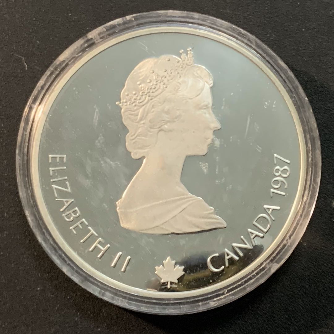 紫瑗钱币—微拍第46期  加拿大 1987年 卡尔加里冬奥会 速滑车 20元  34.1克 0.925银 精制