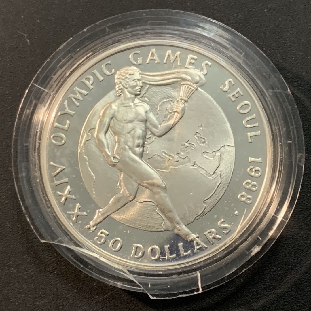 紫瑗钱币—微拍第46期  库克群岛 1987年 汉城奥运会 火炬 50元 28.28克 0.925银 精制