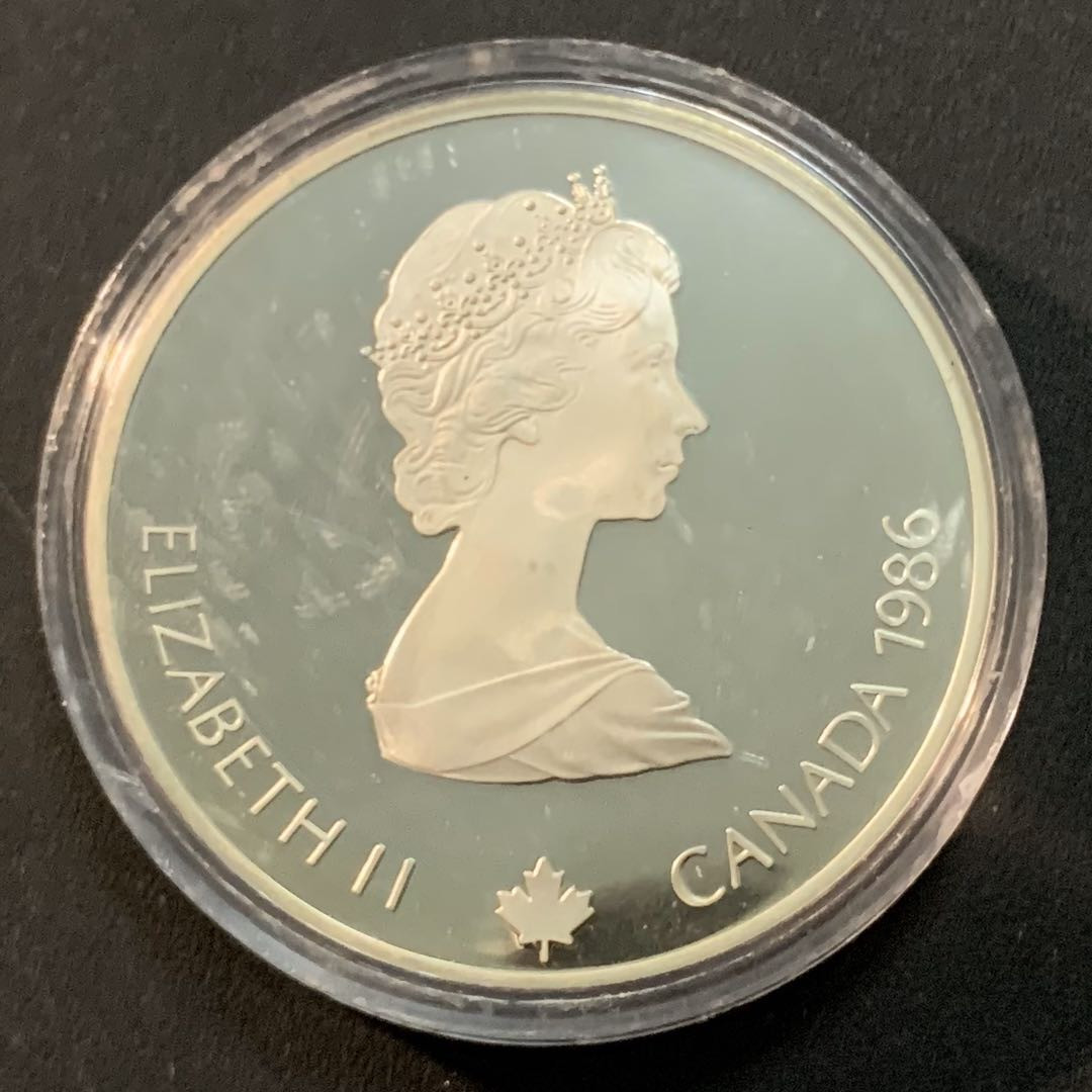 紫瑗钱币—微拍第46期  加拿大 1986年 卡尔加里冬奥会 越野滑雪 20元  34.1克 0.925银 精制