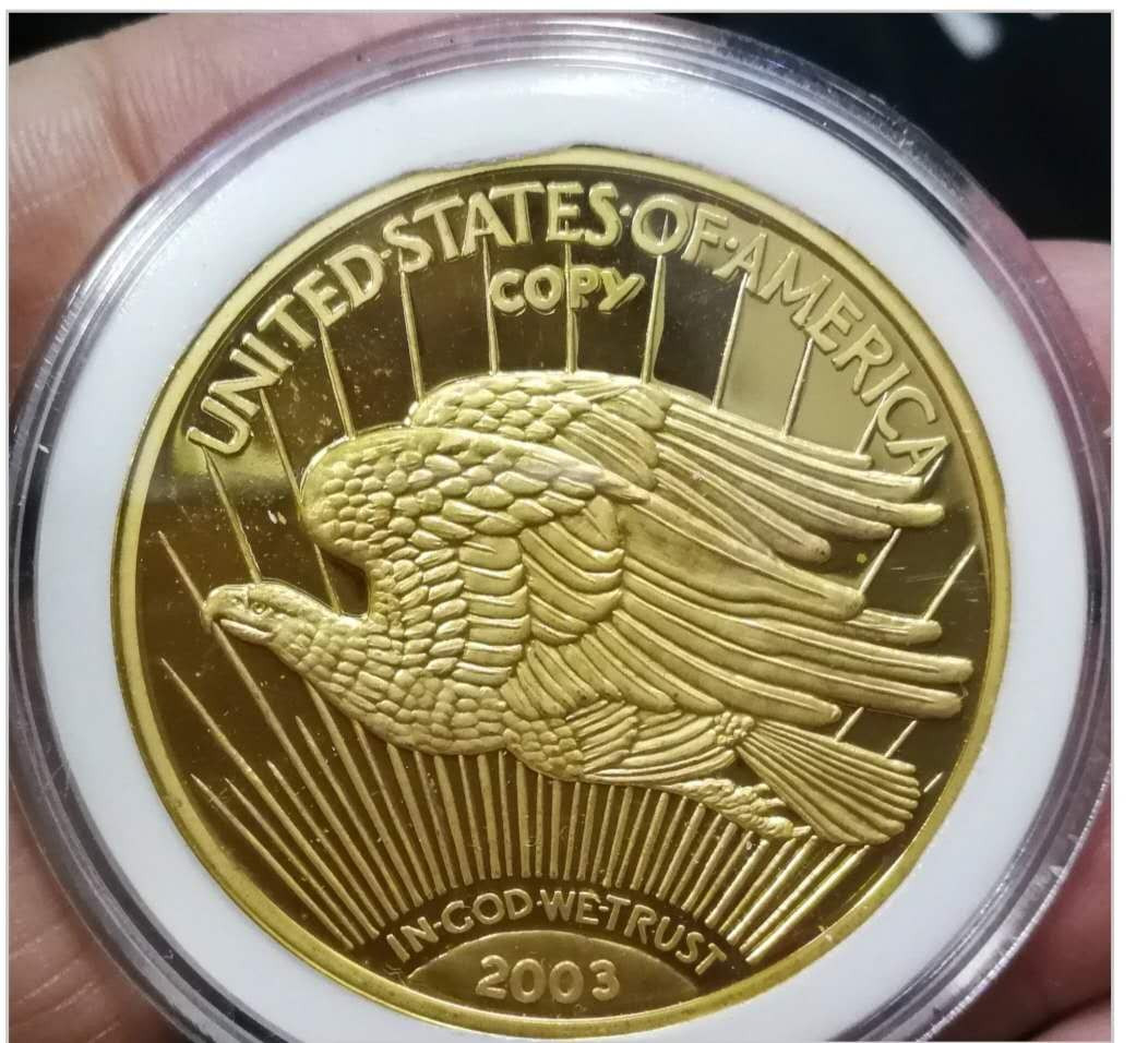 北京马甸外币专卖拍卖第二期。陆续上新敬请关注！ 2003年美国金质纪念章镀金复制品。重量：32.7克。材质：不详，