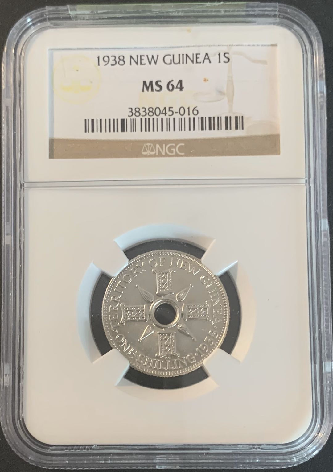 紫瑗钱币—微拍第49期  新几内亚 1938年 1先令 NGC MS64