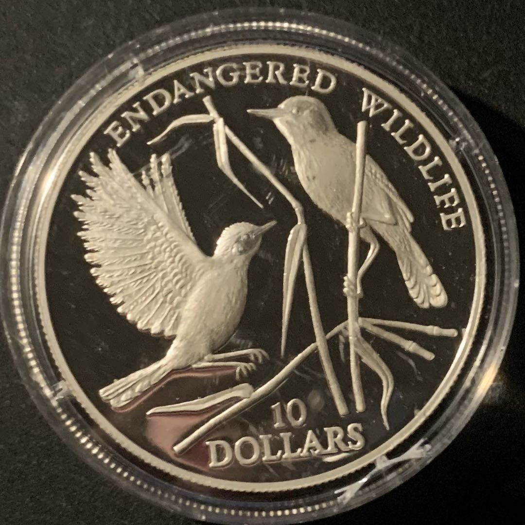 紫瑗钱币—微拍第50期  瑙鲁 1993年 动物系列 唱歌鸟 10元 31.47克 0.925银 精制