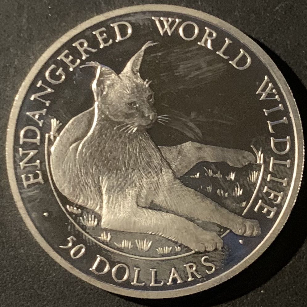 紫瑗钱币—微拍第50期  库克群岛 1990年 世界濒危野生动物系列 折耳猫 50元 19.8克 0.925银 精制