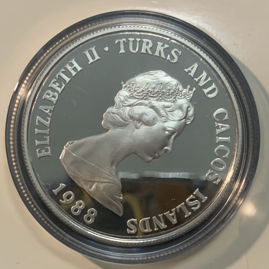 紫瑗钱币—微拍第51期 特克斯与凯恩斯 1988年 WWF25周年 特克斯巨蜥 1克朗 28.28克 0.925银 精制 WWF原装卡