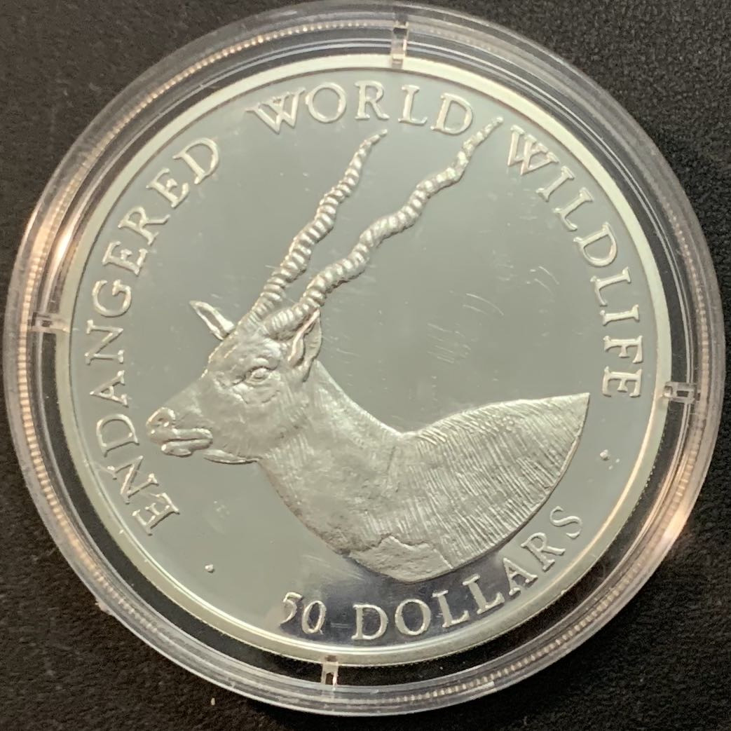 紫瑗钱币—微拍第51期 库克群岛 1990年 世界濒危野生动物系列 北山羊 50元 19.8克 0.925银 精制