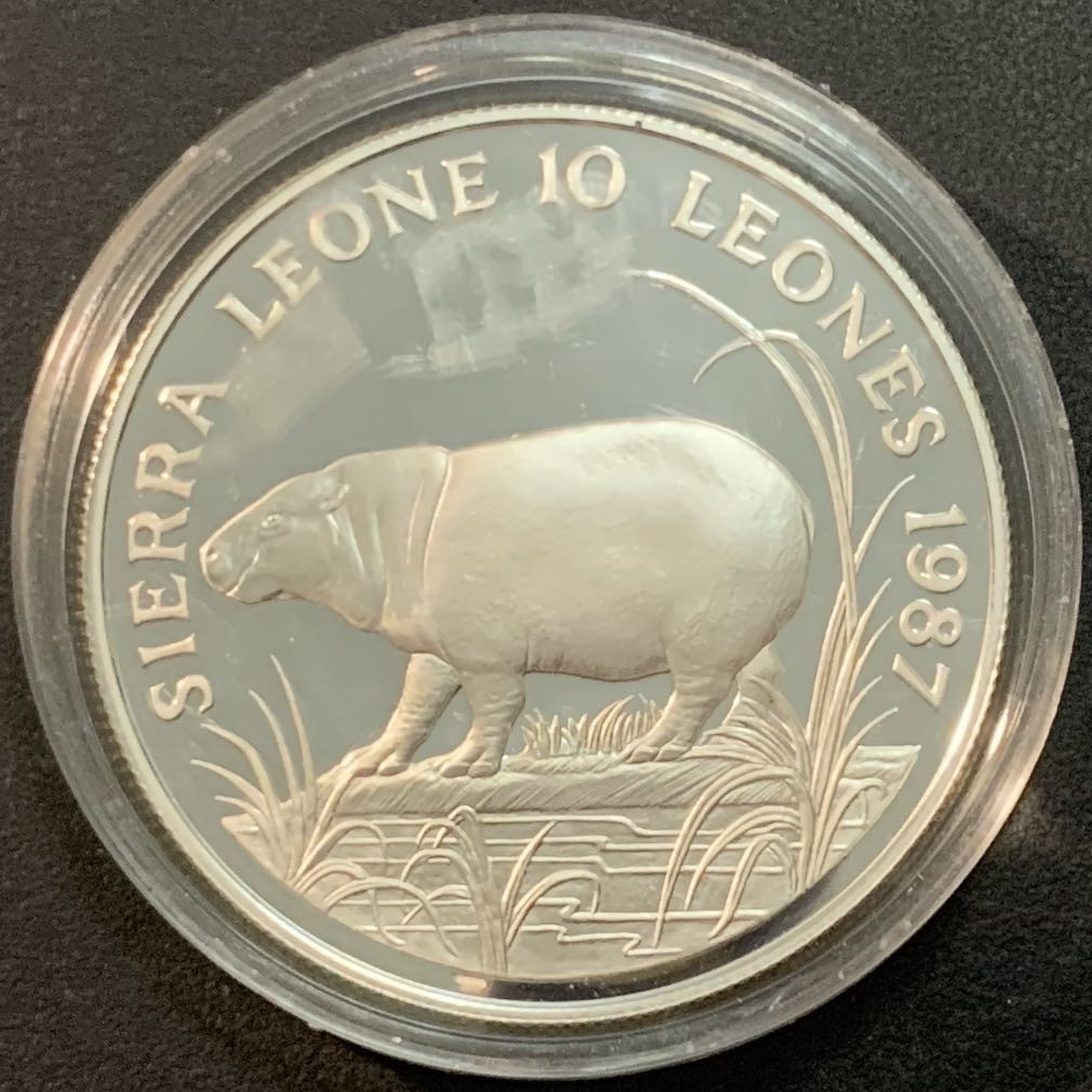 紫瑗钱币—微拍第51期 塞拉利昂 1987年  野生动物系列 侏儒河马 10利昂 28.28克 0.925银 精制