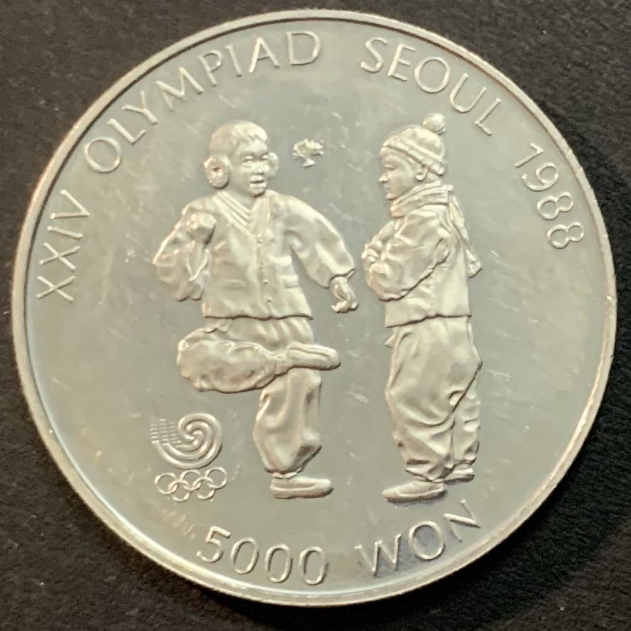 紫瑗钱币—微拍第51期 韩国 1987年 88汉城奥运会 踢毽子 5000韩元  16.81克 0.925银 精制