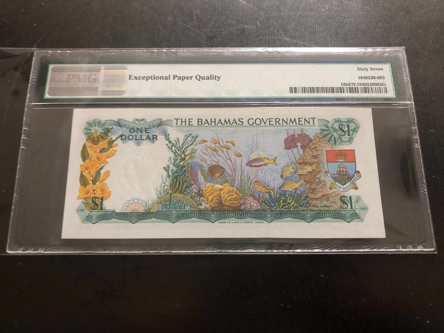 【收藏联盟】第134期拍卖——昆士顿高地战役（共50拍） 巴哈马 1965年首发年份 1元  PMG67EPQ  经典彩背 女王无47号码