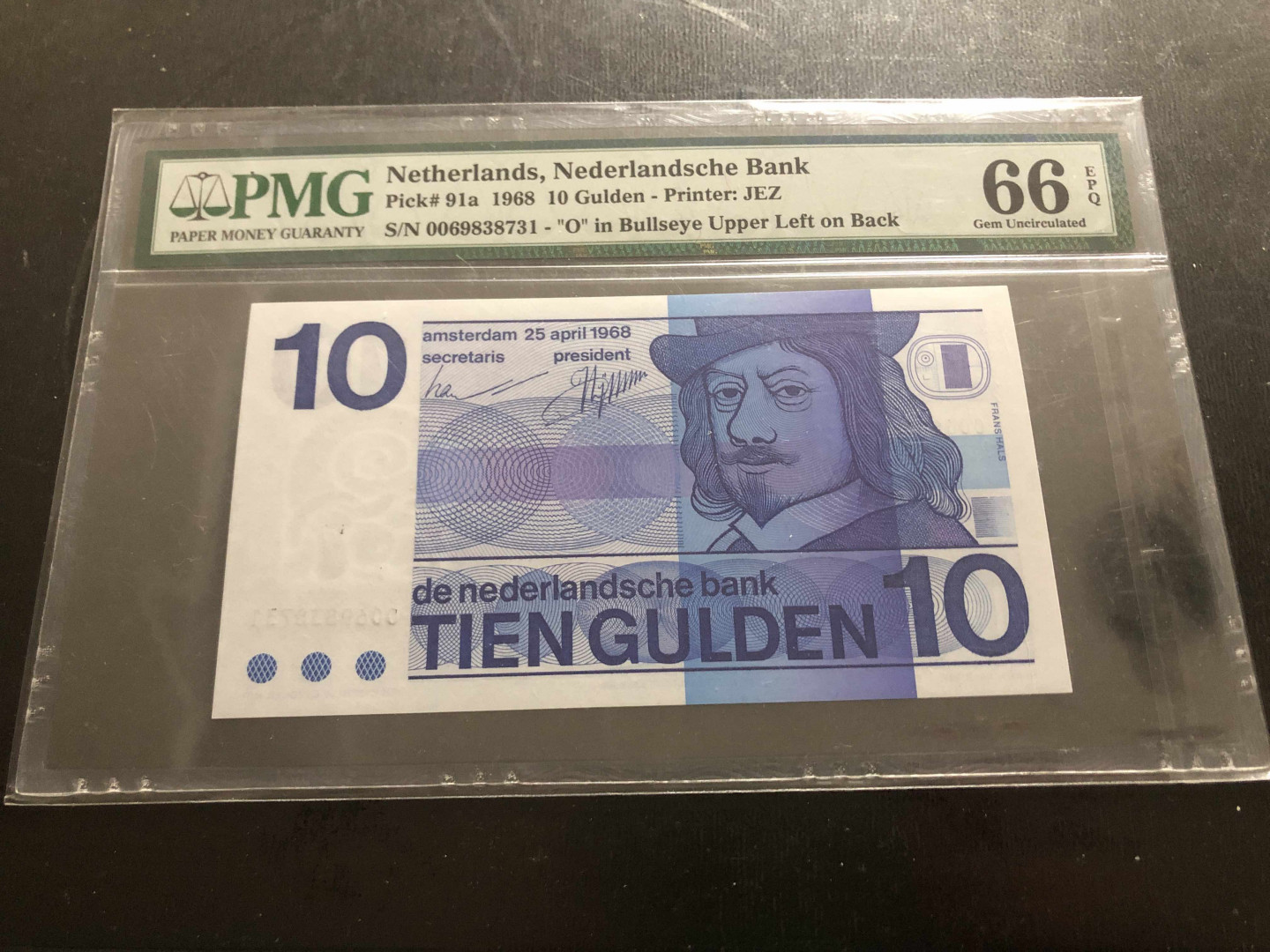 【收藏联盟】第134期拍卖——昆士顿高地战役（共50拍） 【牛眼版】荷兰 1968年 10盾 p91a PMG66EPQ