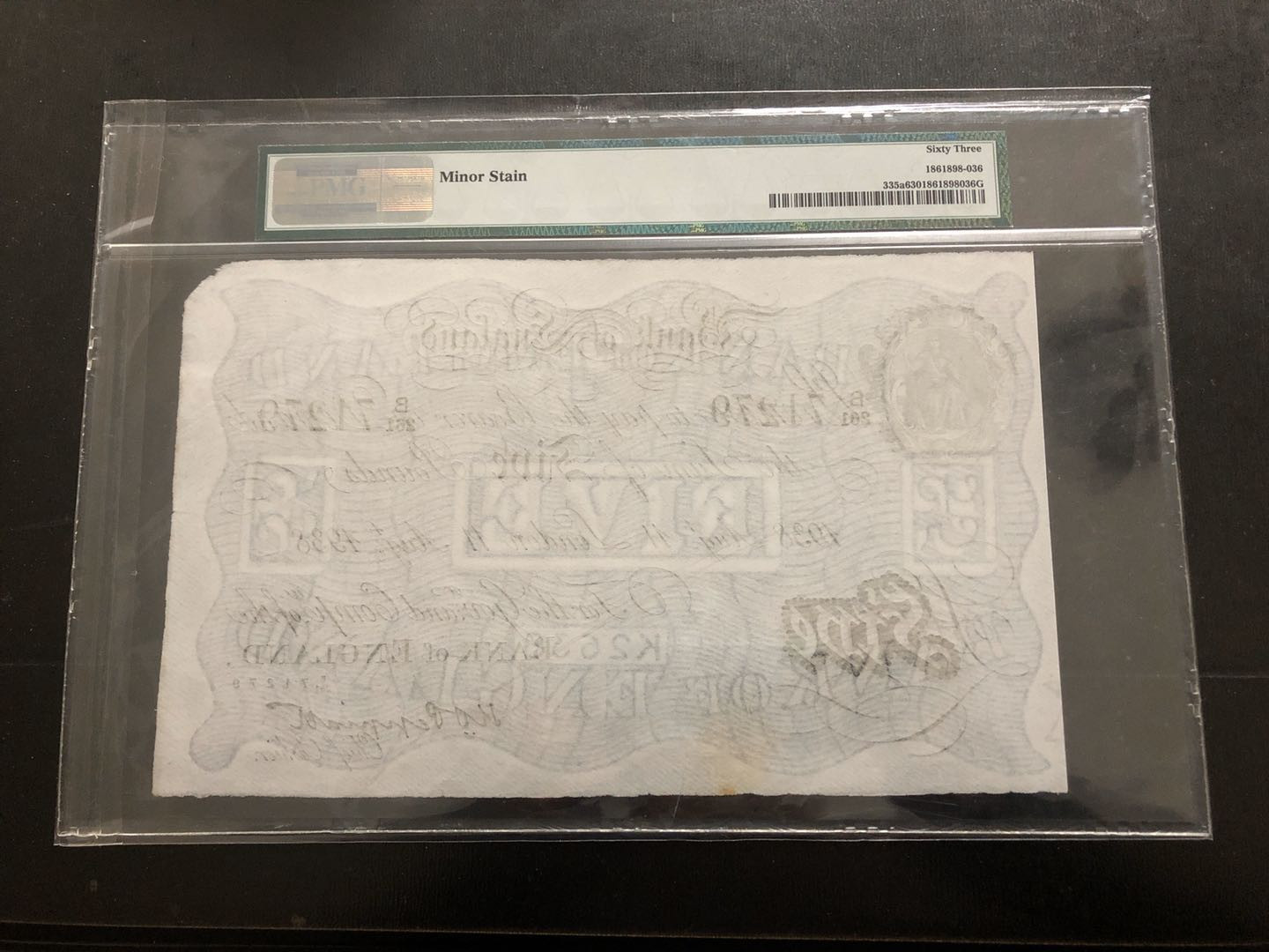 【收藏联盟】第134期拍卖——昆士顿高地战役（共50拍） 英国 1934-44年 二战前白色英镑 5镑 PMG63