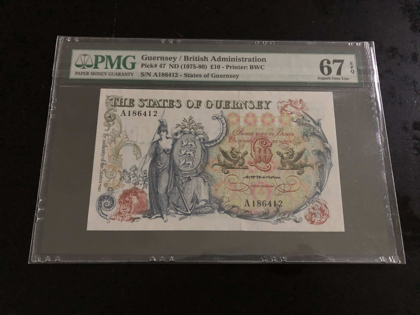 【收藏联盟】第134期拍卖——昆士顿高地战役（共50拍） 根西 1975-80年 10镑 PMG67EPQ  BWC出品 A冠 漂亮 经典“花神”昆士顿高地战役