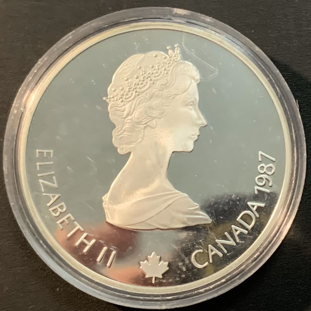 紫瑗钱币—微拍第53期  加拿大 1987年 卡尔加里冬奥会 冰壶 20元  34.1克 0.925银 精制