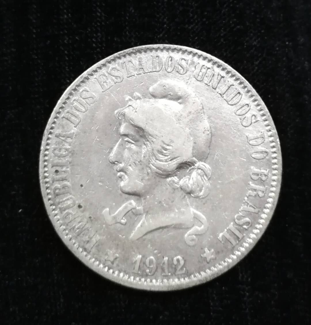 北京马甸外币专卖拍卖第四期，陆续上新，敬请关注 1912年巴西银币，重20克，90银，品相如图