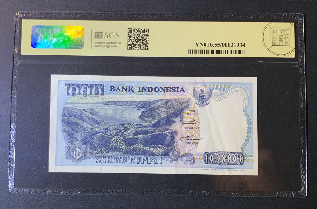 紫瑗钱币—微拍第54期 —纸币场 印度尼西亚 1992年  多巴湖 1000卢比 美评 SGS 55