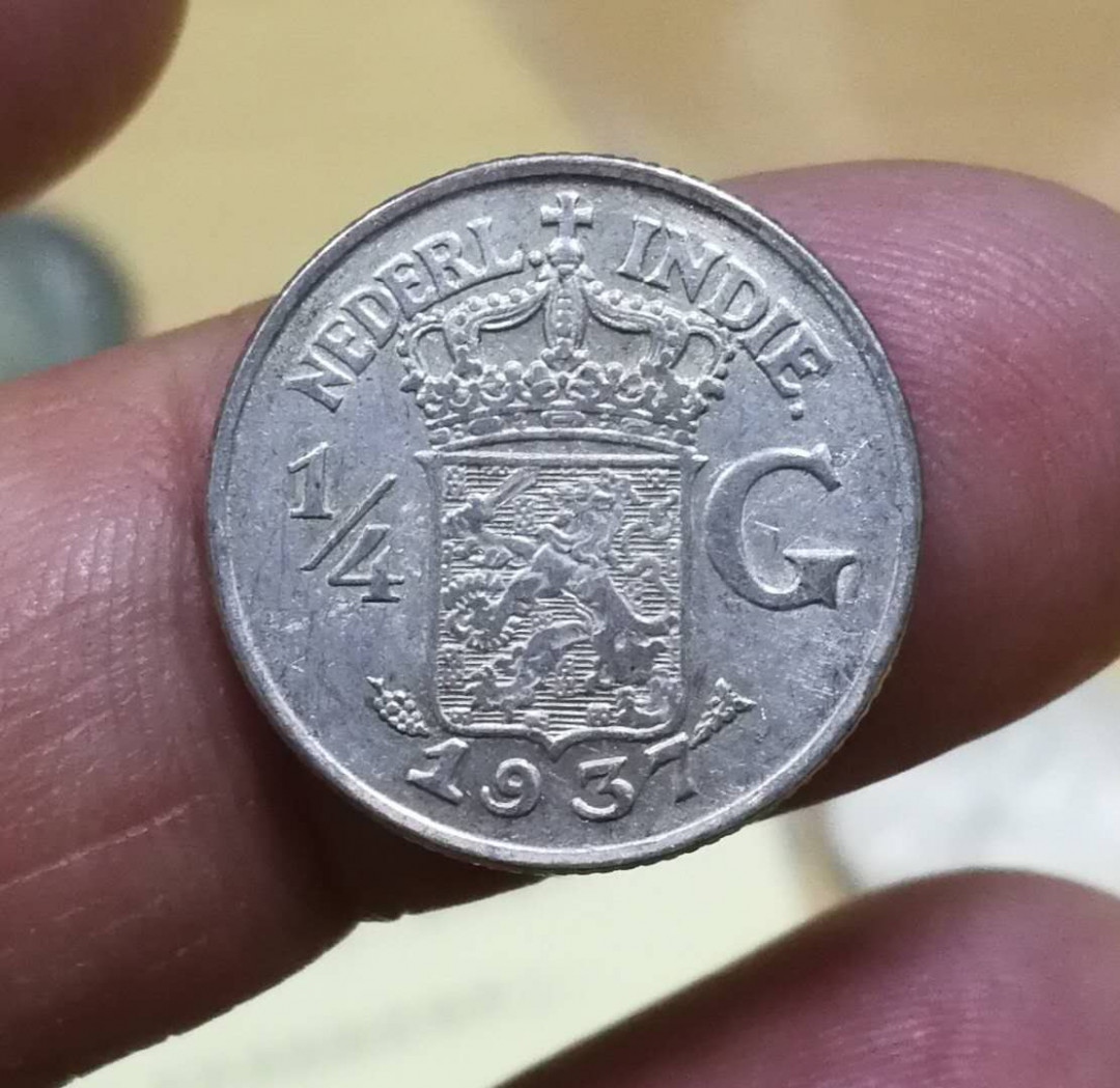 北京马甸外币专卖拍卖第四期，陆续上新，敬请关注 1937年荷属东印度1/4盾银币，重3.18克。72银，品相如图