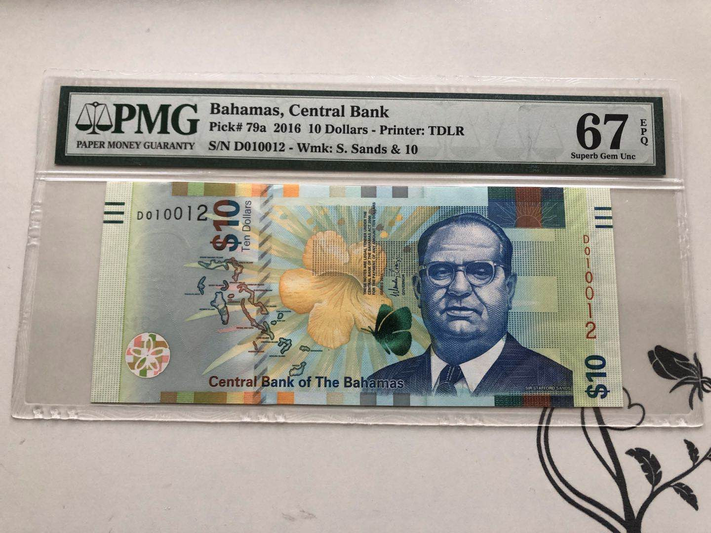 【收藏联盟】第135期拍卖——新西兰大炮筒（共45拍） 巴哈马 2016年10元 PMG67EPQ 背面火烈鸟、灯塔