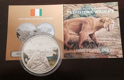 【随心&Getcoins】现代钱币拍卖第四十九期 科特迪瓦2011年剑齿虎彩色银币
