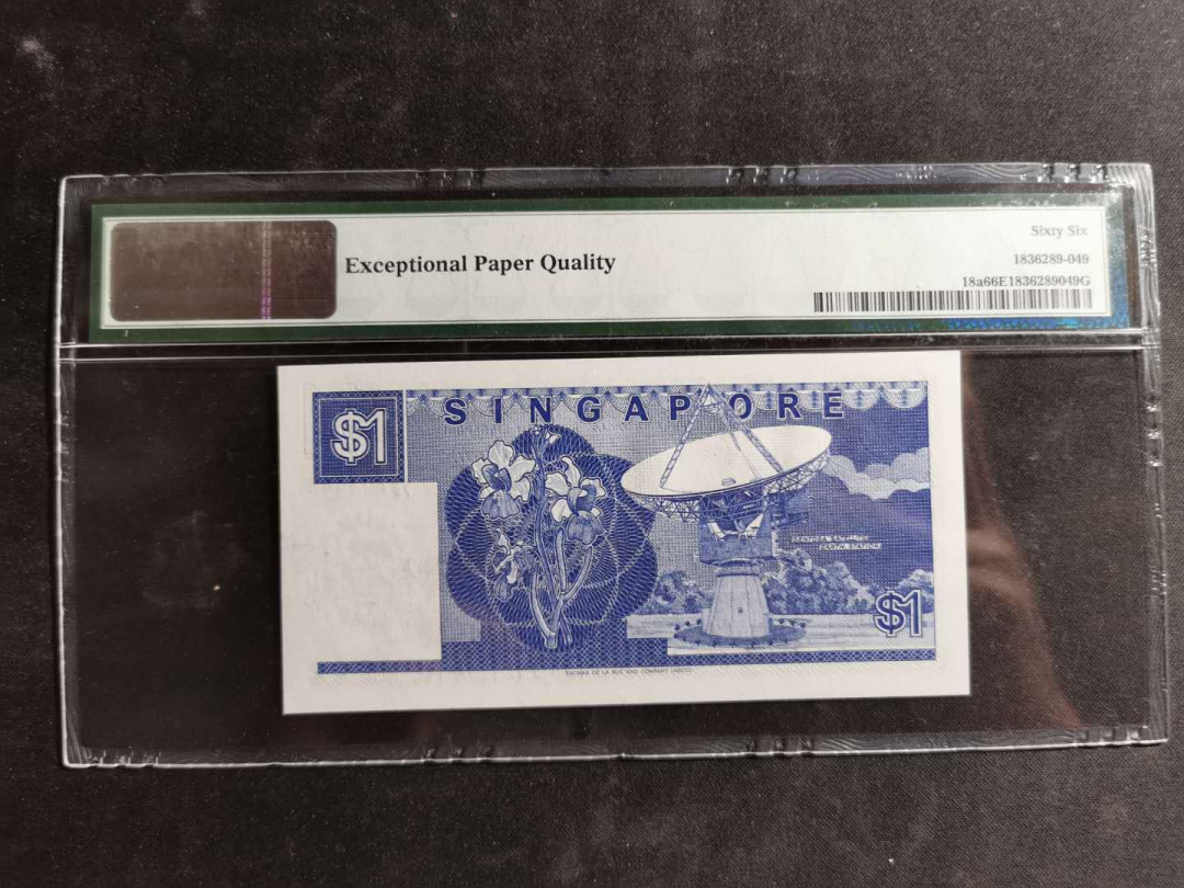 【鲸贝乐淘】千字文·第“空谷传声，虚堂习听”号拍卖 【新加坡🇸🇬】1987年1元船版，pMG66E 