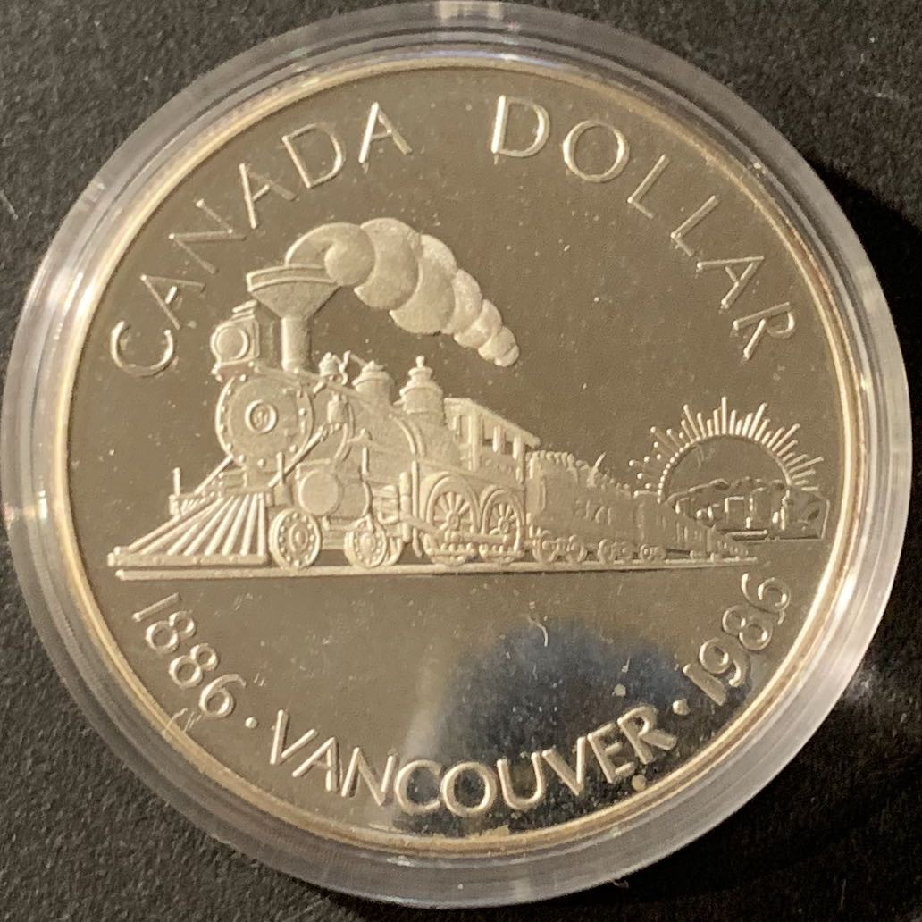 紫瑗钱币—微拍第55期  加拿大 1986年 温哥华火车百年 1元 23.3克 0.5银 精制 原盒