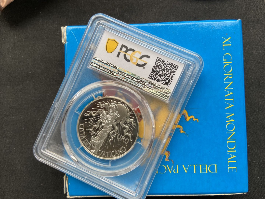 【币观天下】107期钱币拍卖 【梵蒂冈】2007年世界和平日银币