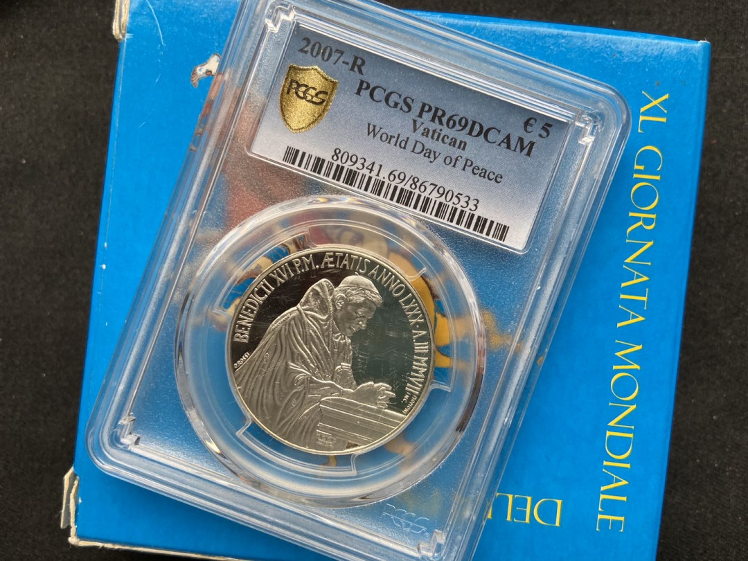 【币观天下】107期钱币拍卖 【梵蒂冈】2007年世界和平日银币