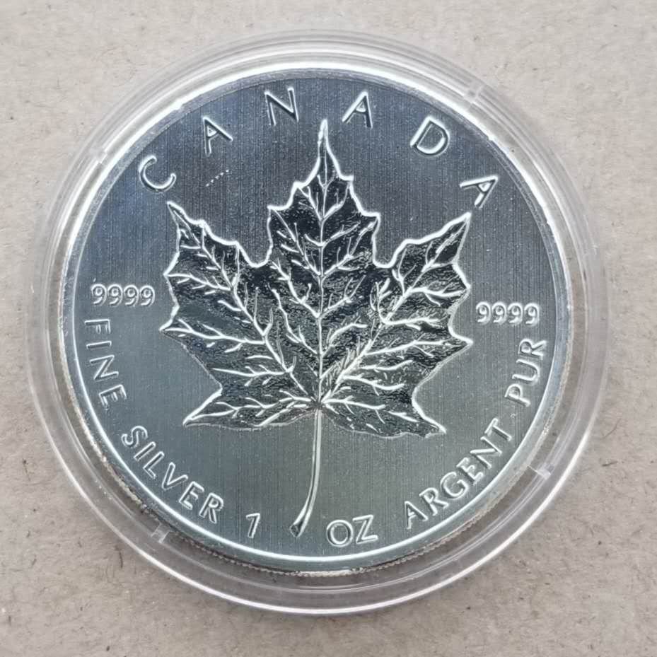 【币观天下】107期钱币拍卖 加拿大2012年枫叶1盎司银币  BU品如图。