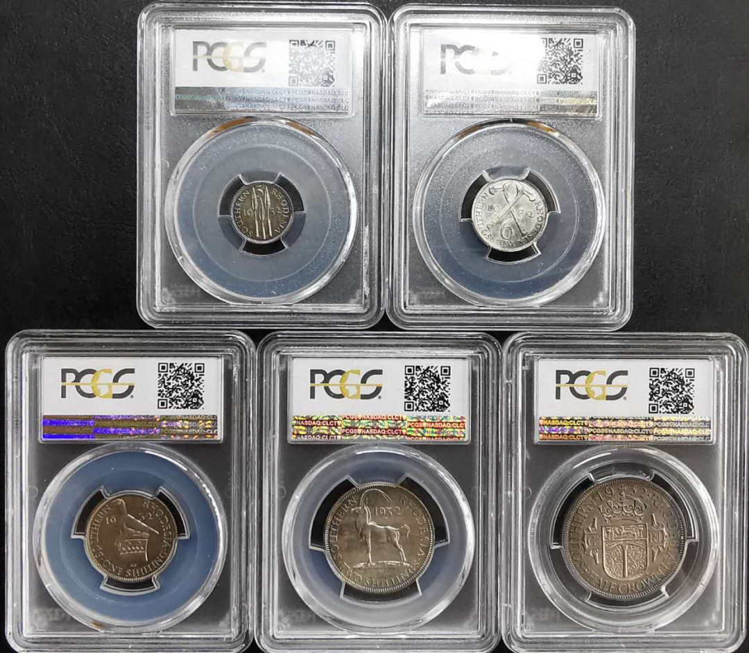 凡希社世界钱币微拍第一百二十期精品专场 稀！1932英属南罗得西亚乔五PS五枚PCGS-MS64-66五彩高分！