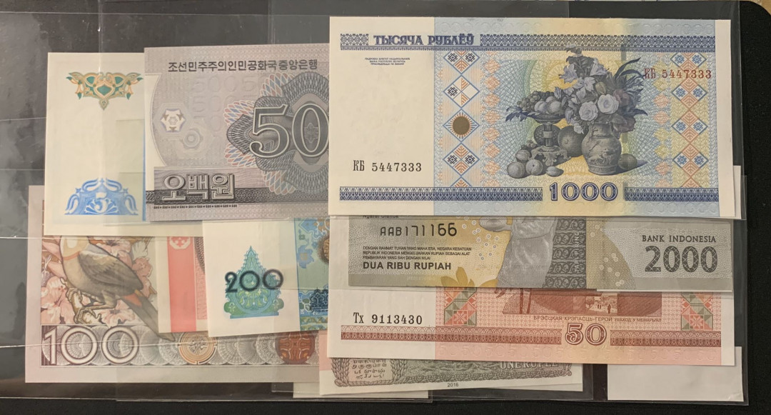 紫瑗钱币—微拍第63期—纸币场  各国全新纸币 9枚一组