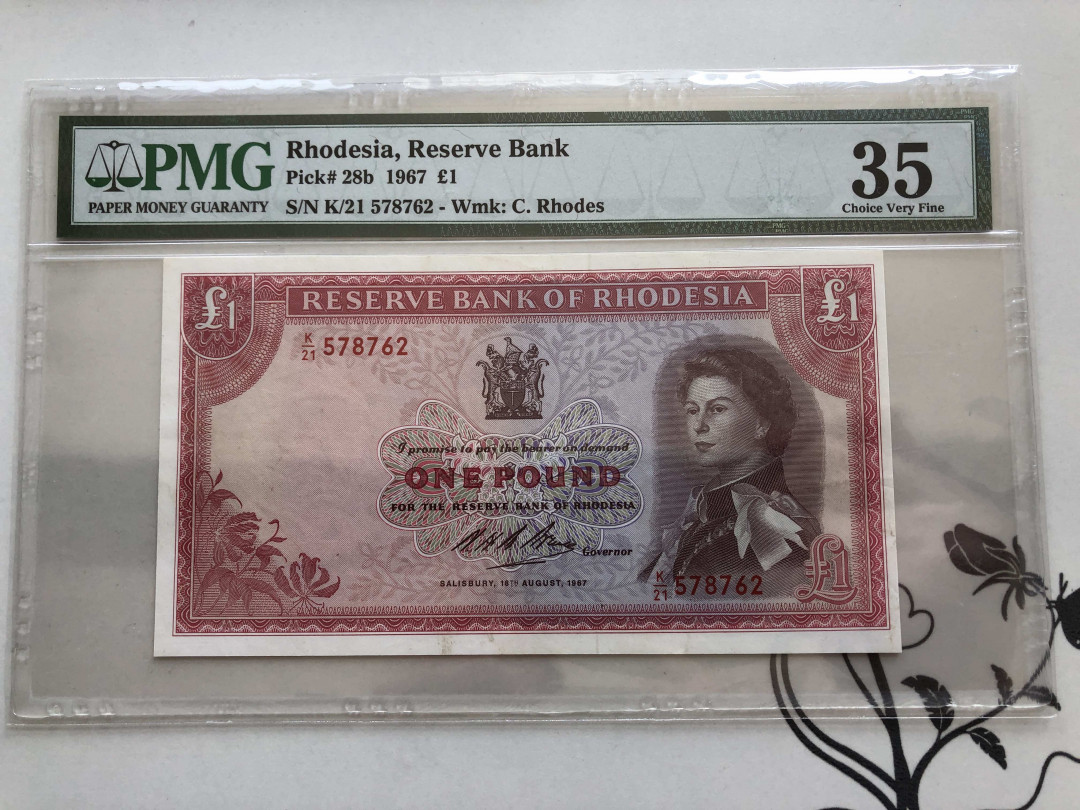 【收藏联盟】第140期拍卖——丰收的喜悦（共50拍） 罗德西亚 1967年 1镑 PMG35 女王纸币