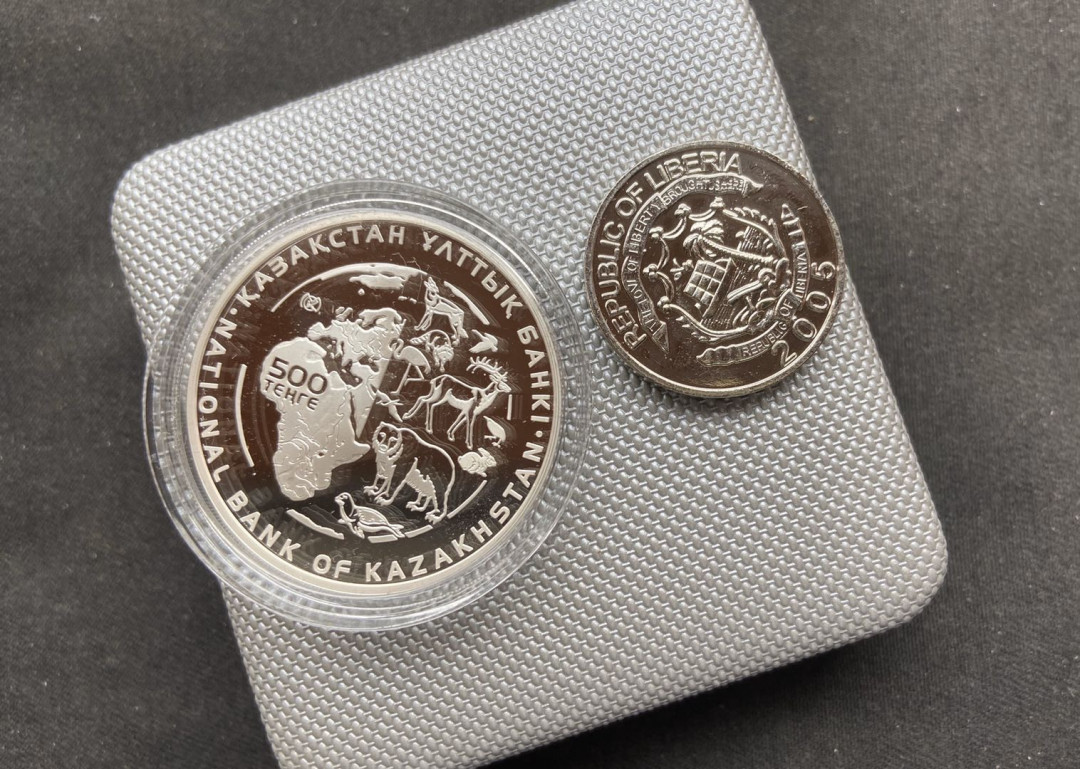 【币观天下】第108期钱币拍卖【520专拍】 【哈萨克斯坦】哈萨克斯坦红皮书系列动物兔狲【赠品小狗纪念章】