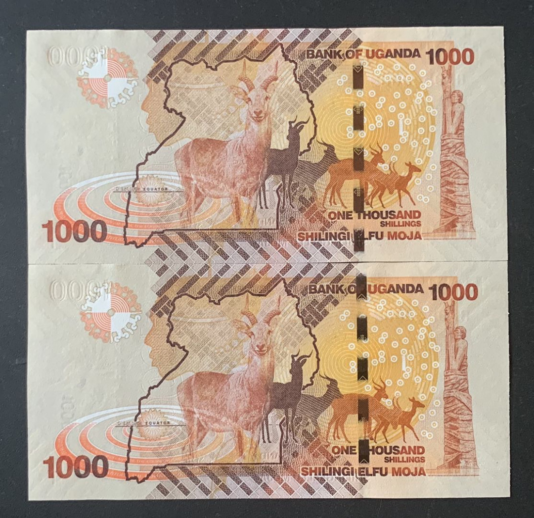 紫瑗钱币—微拍第67期—纸币场 乌干达 2013年 1000先令 2枚一组 UNC P-49b