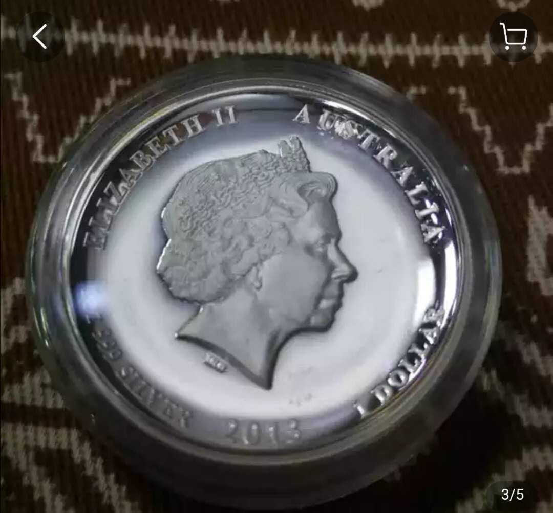 北京马甸外币专卖拍卖第八期，陆续上新，欢迎关注 2013年澳大利亚生肖蛇1盎司加厚精制银币，品相如图，有证无盒