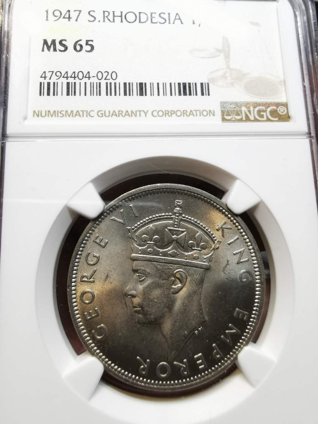 凡希社世界钱币微拍第一百二十一期 1947英属南罗得西亚乔六1/2克朗NGC-MS65顶级品！