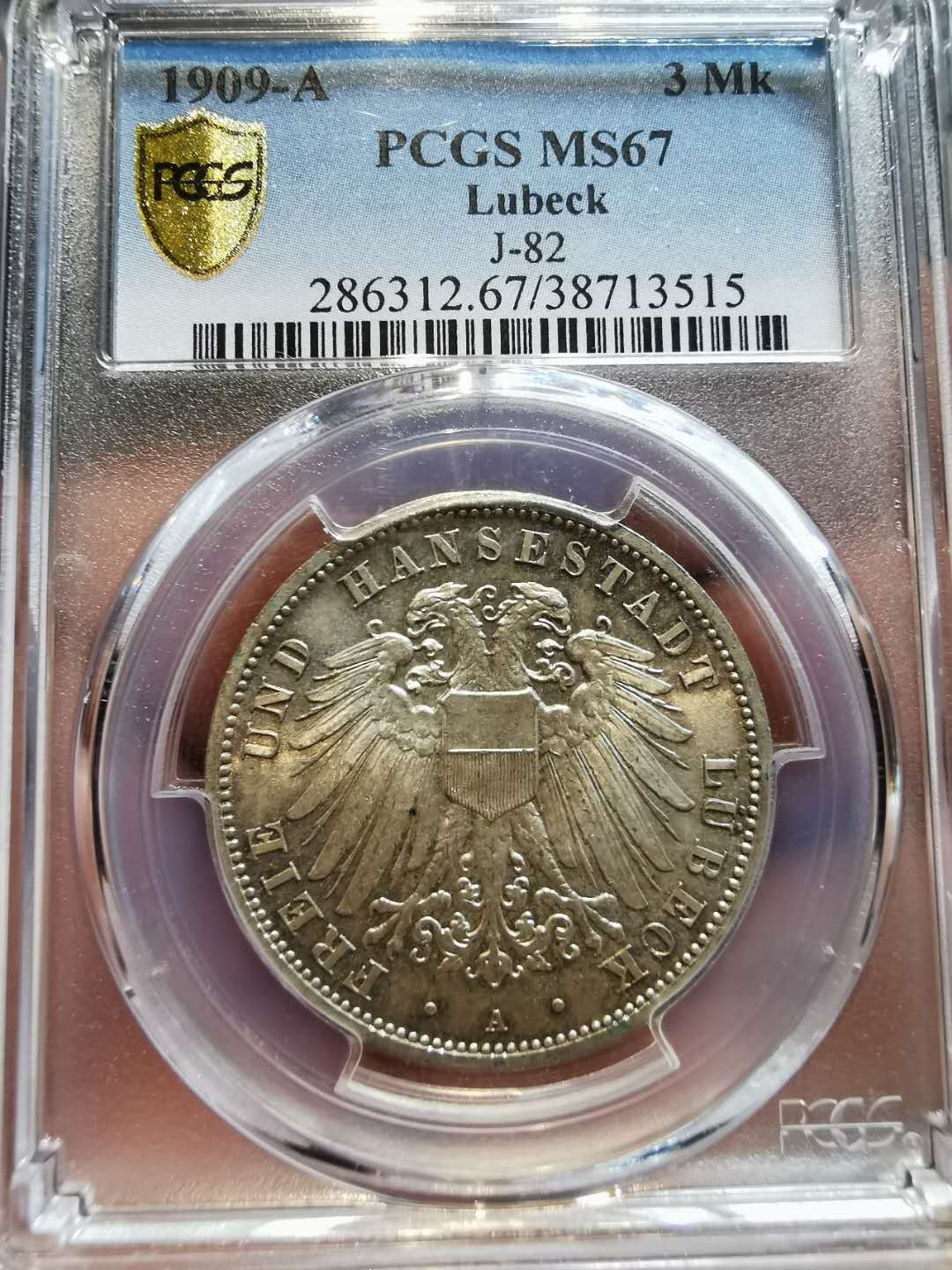 凡希社世界钱币微拍第一百二十一期 稀！1909吕贝克双头鹰3马克PCGS-MS67冠军分！