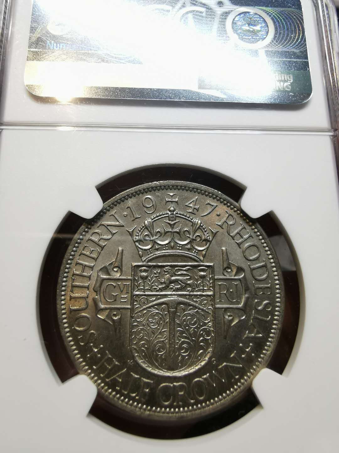 凡希社世界钱币微拍第一百二十一期 1947英属南罗得西亚乔六1/2克朗NGC-MS65顶级品！