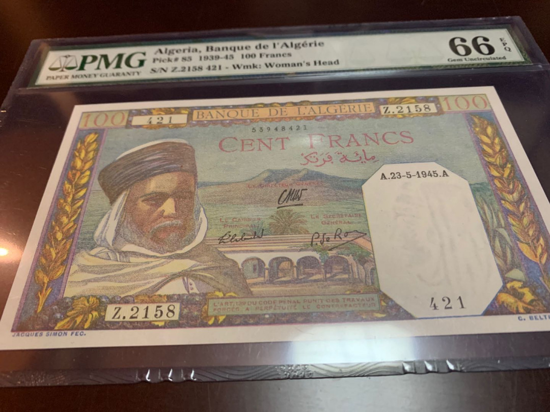 【收藏联盟】第141期拍卖——奥斯陆大学的英杰（共50拍） 阿尔及利亚 1939-45年100法郎 PMG66EPQ