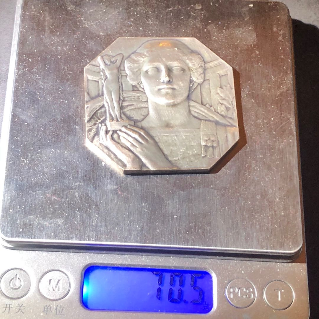 新艺术名家周末拍卖会 少见八角女神银章