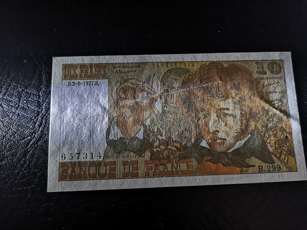 《外钞收藏家》第八十期拍卖 法国1977年10法郎 帅气油画风人物 全新unc 常见点钞痕