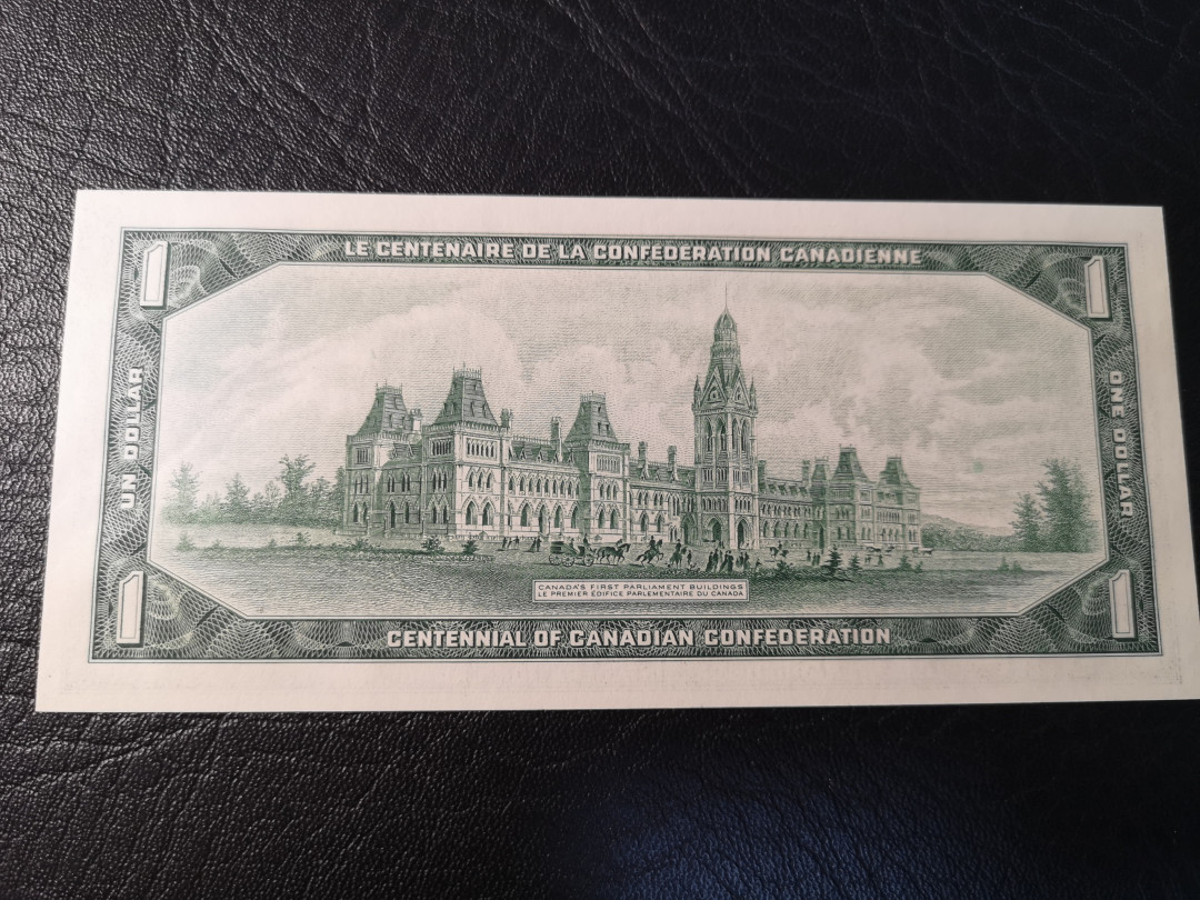 《外钞收藏家》第八十期拍卖 加拿大1967年1加元 百年纪念钞 非常精美的一张绿钞 全新unc
