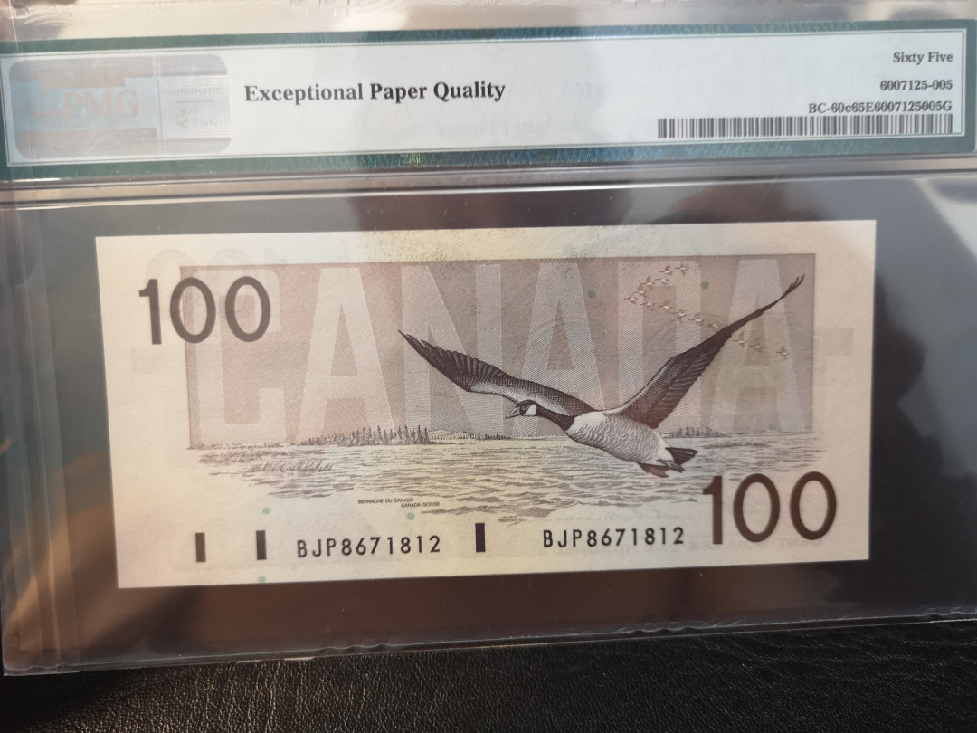 《外钞收藏家》第八十期拍卖 1988年加拿大鸟版100 pmg65