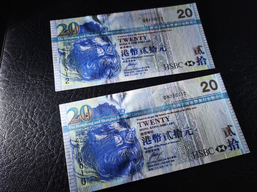 《外钞收藏家》第八十期拍卖 2000年港币20 两连号 全新unc