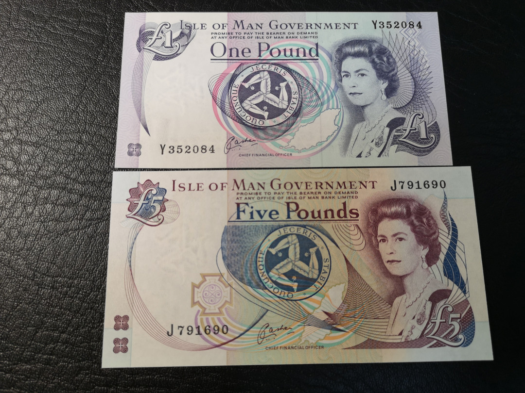 《外钞收藏家》第八十期拍卖 马恩1、5镑 两张 全新unc