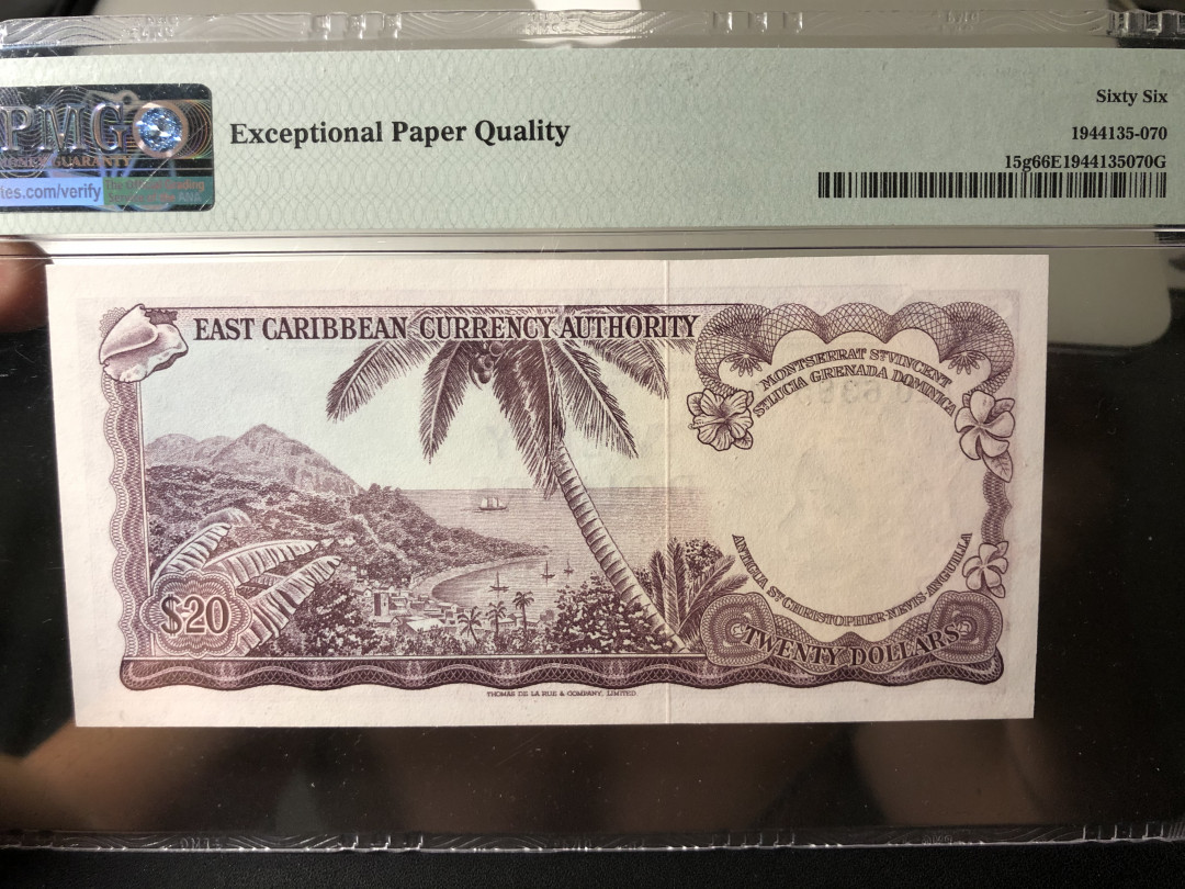 《外钞收藏家》第八十期拍卖 东加勒比20元 姿色戎装女王 pmg66 全新壳 品相完美