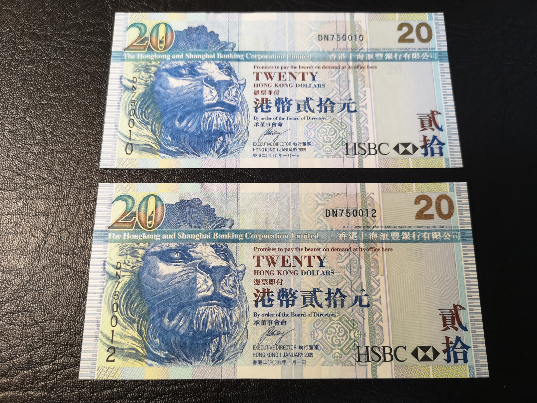 《外钞收藏家》第八十期拍卖 2000年港币20 两连号 全新unc