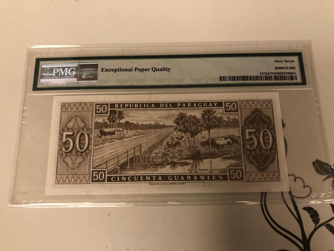 【收藏联盟】第146期拍卖——北非后花园（共50拍） 【冠军分】巴拉圭 1952年50Guaranies  PMG67EPQ 
