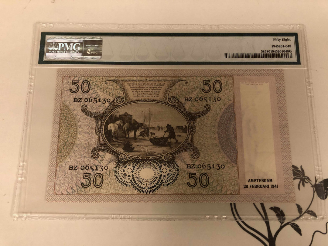 【收藏联盟】第146期拍卖——北非后花园（共50拍） 荷兰 1941-43年50盾 PMG58 吃牡蛎的小女孩